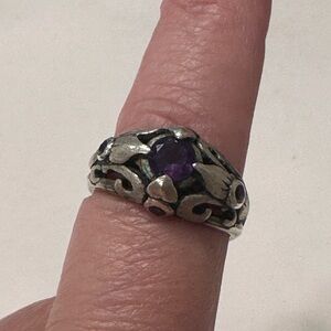 Intricate Silver Ring with Deep Purple Stone